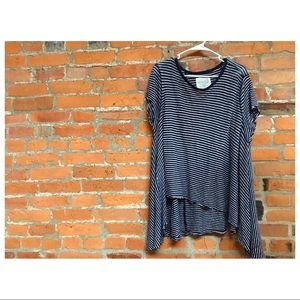 Oversized “worn in” tee made by We The Free.